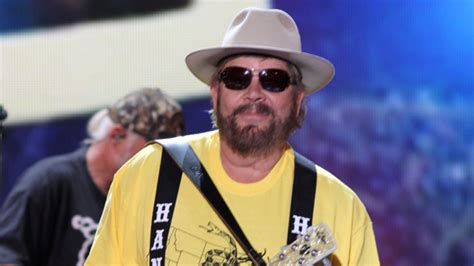 why does hank jr wear sunglasses